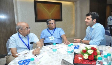 Sundeep Talwar, CMO, Akshaya Patra (right) discussing the moto behind the event with guests